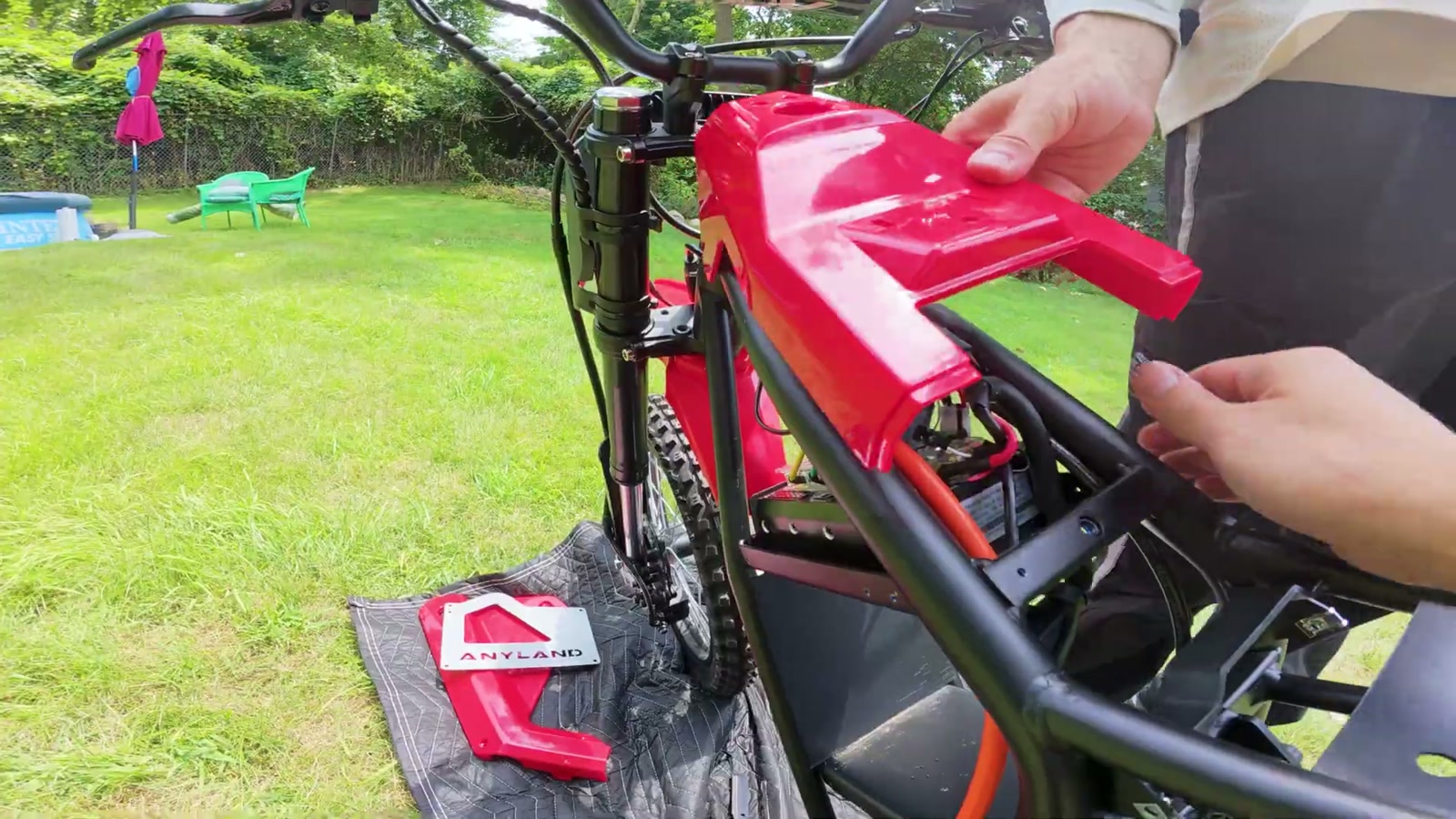 Video still from Anyland Rev 01 Mini Electric Dirt Bike Review: The Moxin Controller and Full-Twist Throttle Make It at 10:34
